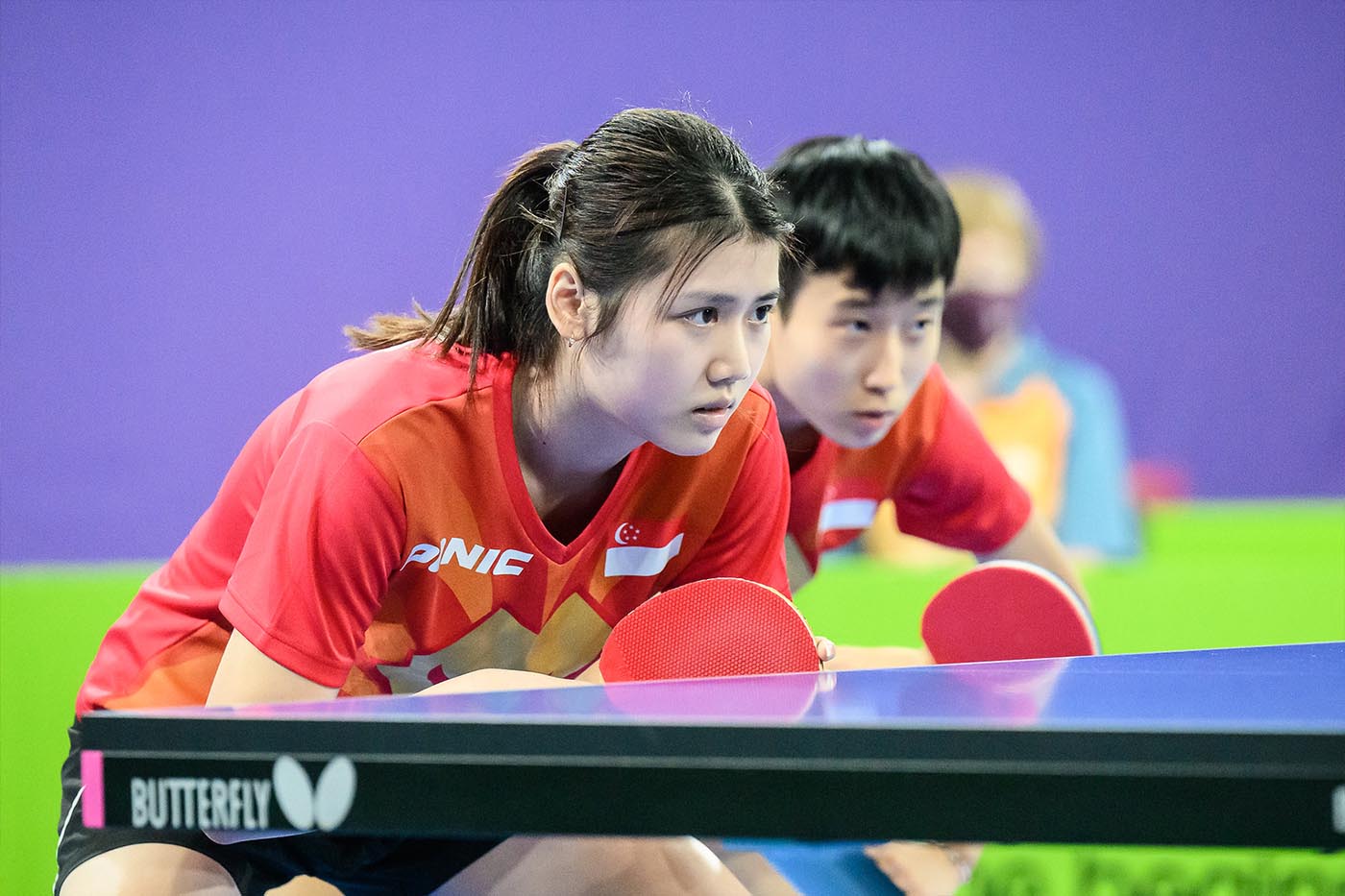 GIVING HER BEST SHOT AT TABLE TENNIS